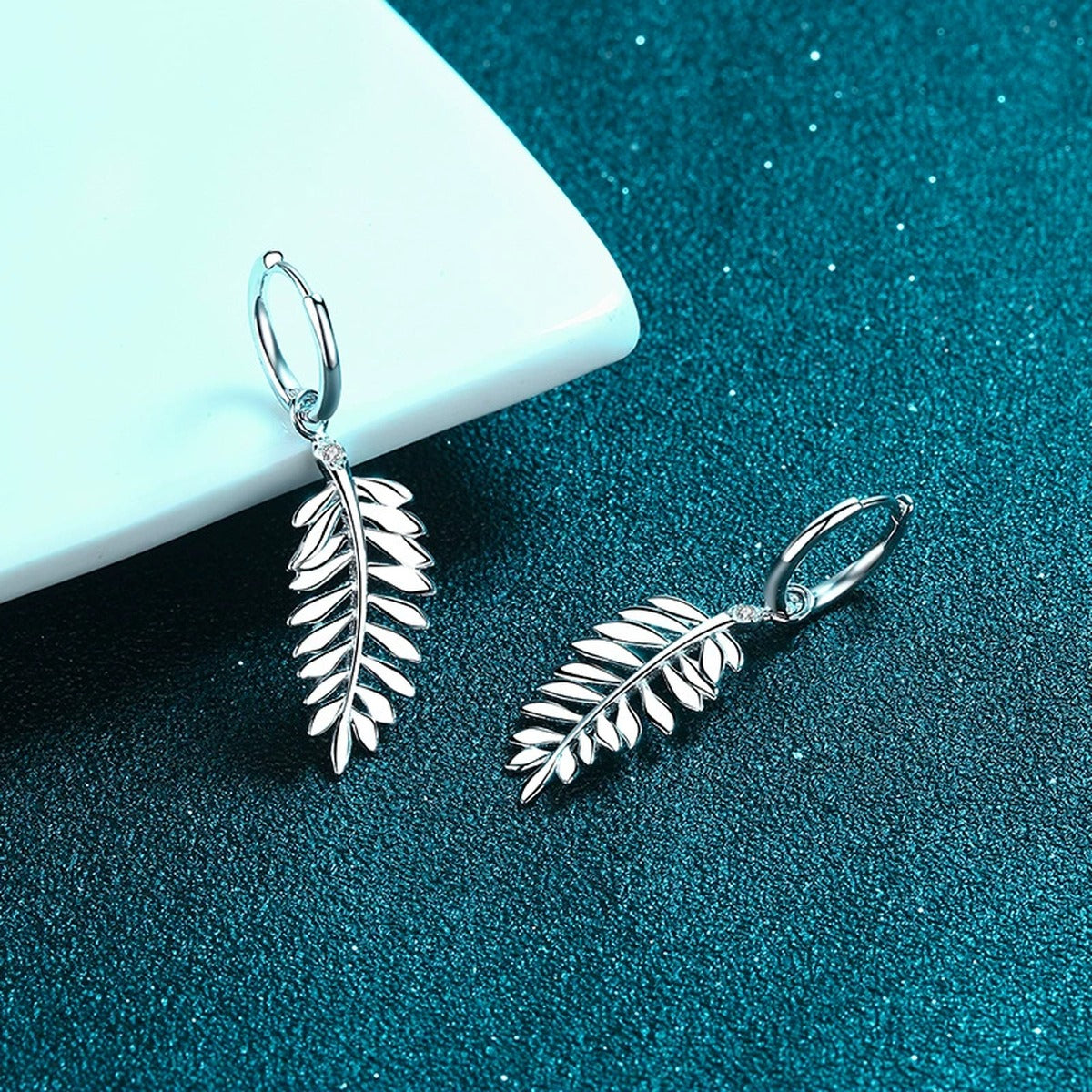 Feather Moissanite Hoop Dangle Earrings in Rhodium-Plated S925 sterling silver product scene view showing side profile