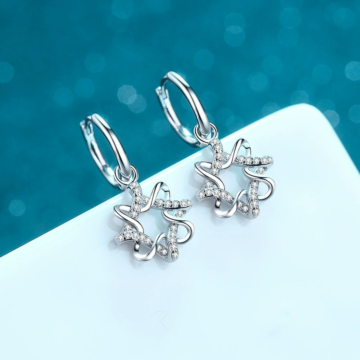 Floral Moissanite Hoop Dangle Earrings in Rhodium-Plated S925 sterling silver product scene view showing side profile