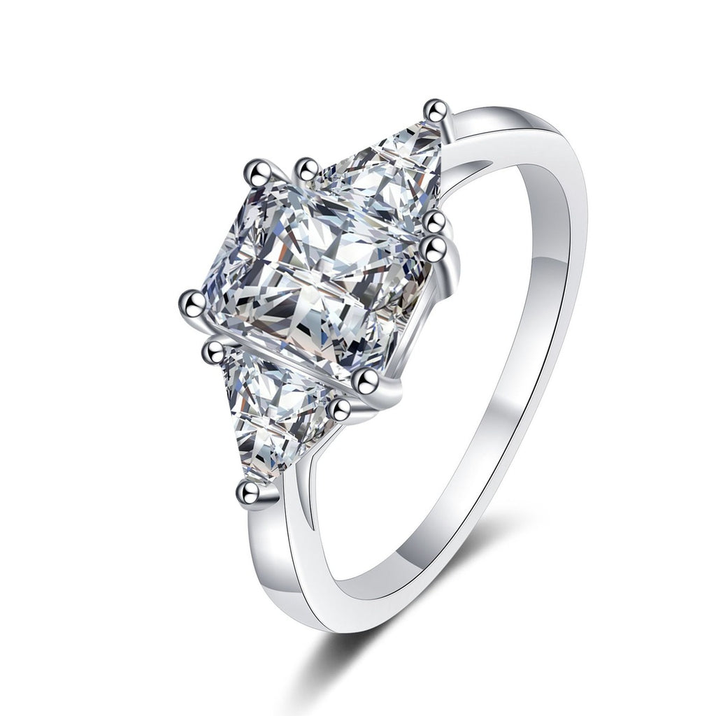Emerald and Radiant Cut Moissanite Ring in rhodium-plated S925 sterling silver on clean white background