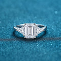 Emerald and Radiant Cut Moissanite Ring product view showing moissanite setting and rhodium finish