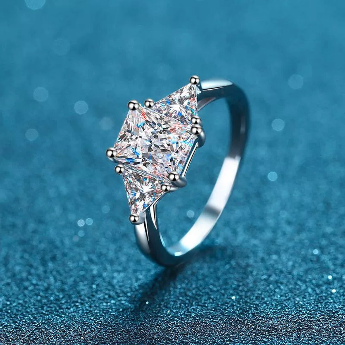 Emerald and Radiant Cut Moissanite Ring product view showing moissanite setting and rhodium finish