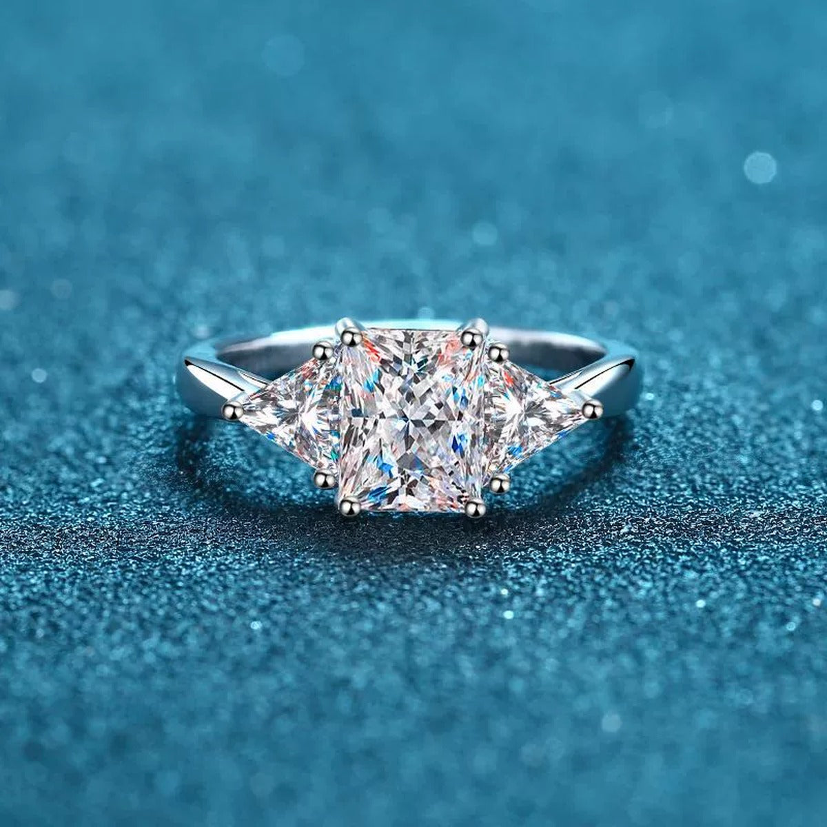 Emerald and Radiant Cut Moissanite Ring product view showing moissanite setting and rhodium finish