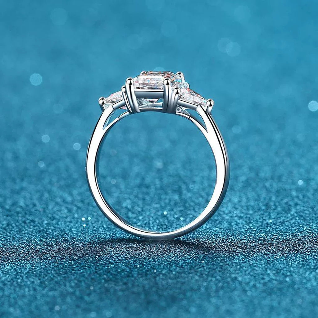 Emerald and Radiant Cut Moissanite Ring product view showing moissanite setting and rhodium finish