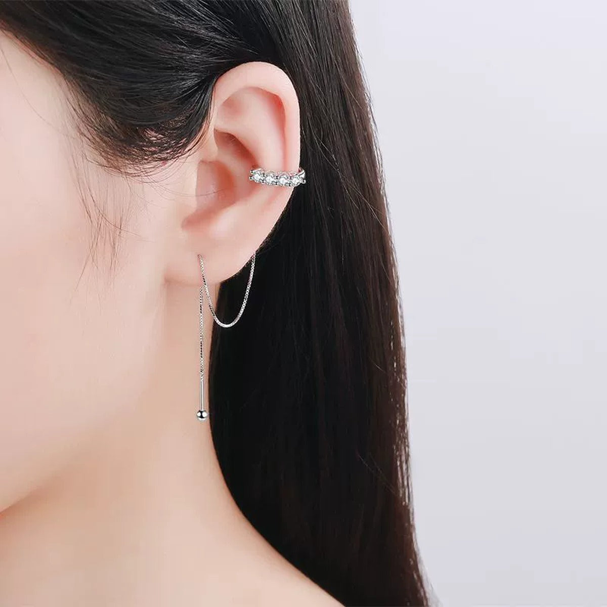 Moissanite Ear Climber Threader Earrings in Rhodium-Plated S925 sterling silver worn on ear by model showing scale, placement, and ear climber threader earrings styling