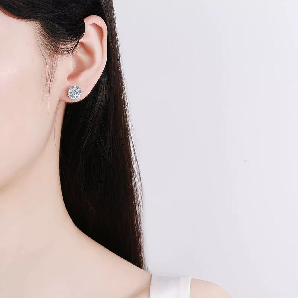 Cluster Moissanite Stud Earrings in Rhodium-Plated S925 sterling silver worn on ear by model showing scale, placement, and stud earrings styling