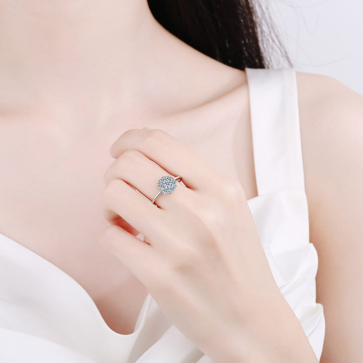 Round Moissanite Cluster Ring worn on hand to show scale, band width, and ring profile