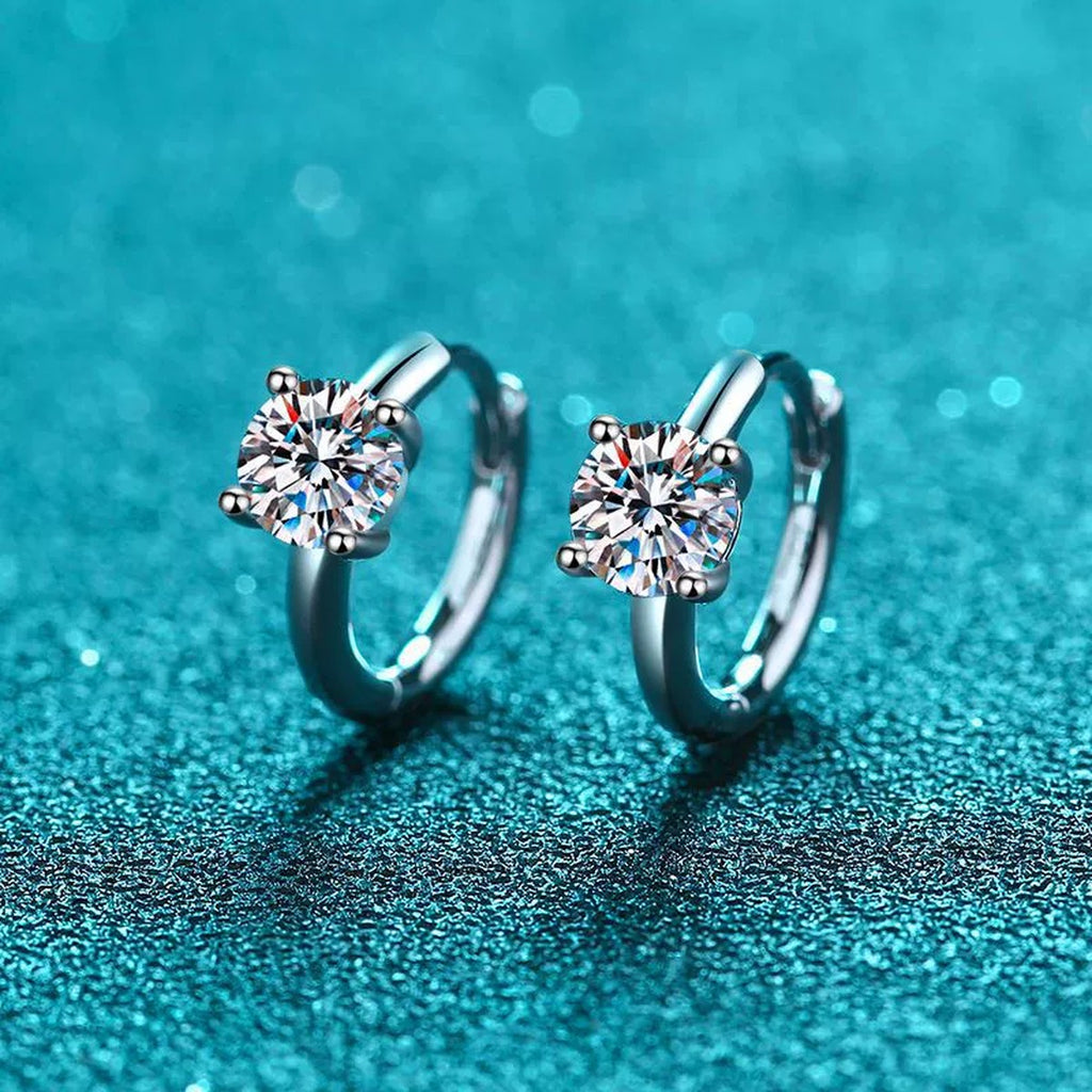 Round Moissanite Huggie Hoop Earrings in Rhodium-Plated S925 sterling silver product scene view showing front sparkle