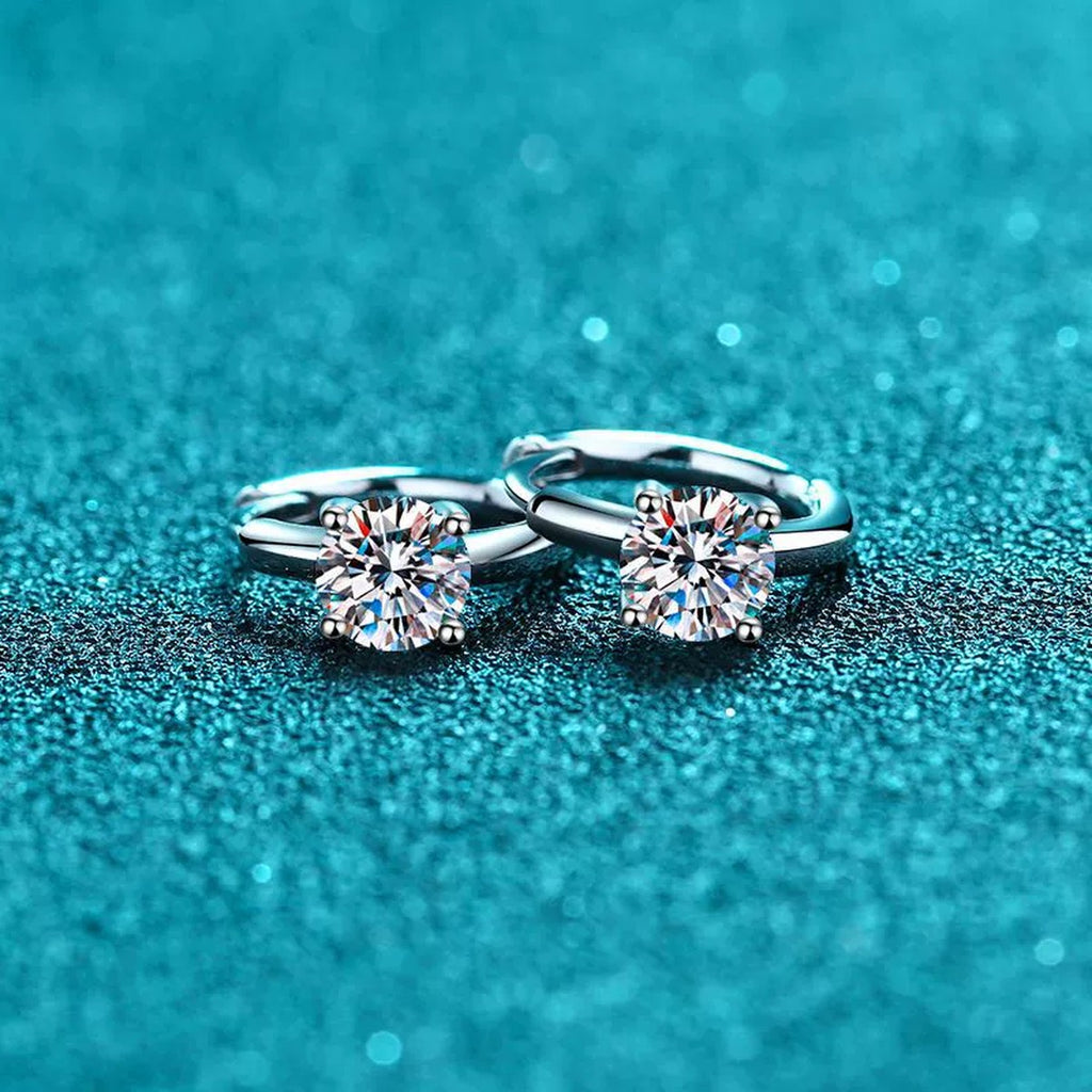 Round Moissanite Huggie Hoop Earrings in Rhodium-Plated S925 sterling silver product scene view showing angled setting detail