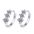 Graduated Moissanite Huggie Hoop Earrings in Rhodium-Plated S925 sterling silver white background product photo showing the pair, stone shape, and huggie hoop earrings silhouette