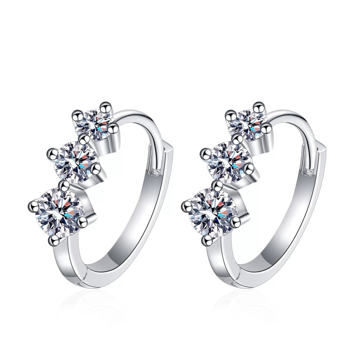 Graduated Moissanite Huggie Hoop Earrings in Rhodium-Plated S925 sterling silver white background product photo showing the pair, stone shape, and huggie hoop earrings silhouette