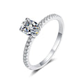 Oval Cut Moissanite Ring with CZ in rhodium-plated S925 sterling silver on clean white background