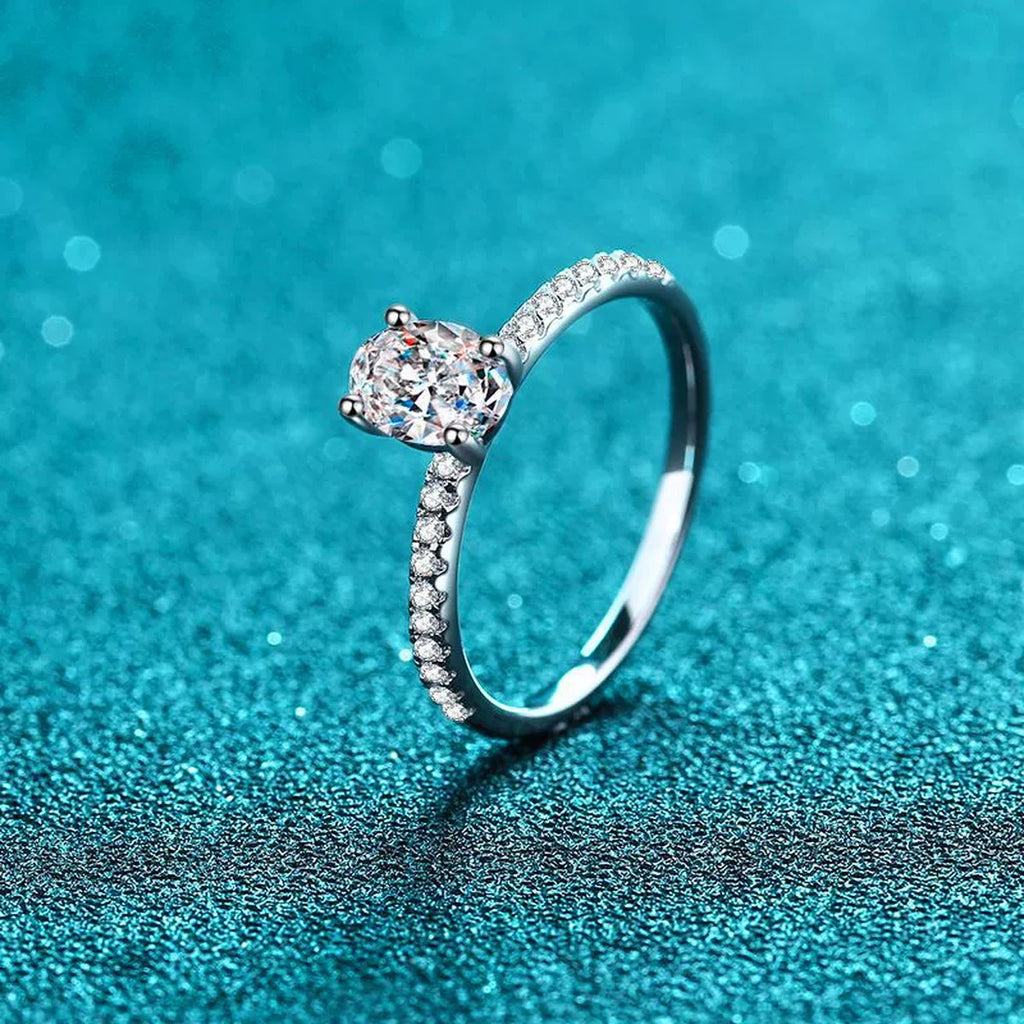 Oval Cut Moissanite Ring with CZ product view showing moissanite setting and rhodium finish