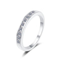 Round Moissanite Twist Ring in rhodium-plated S925 sterling silver on clean white background