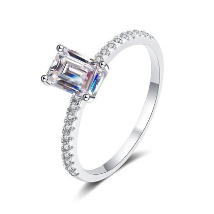 Emerald and Radiant Cut Moissanite Ring with CZ in rhodium-plated S925 sterling silver on clean white background