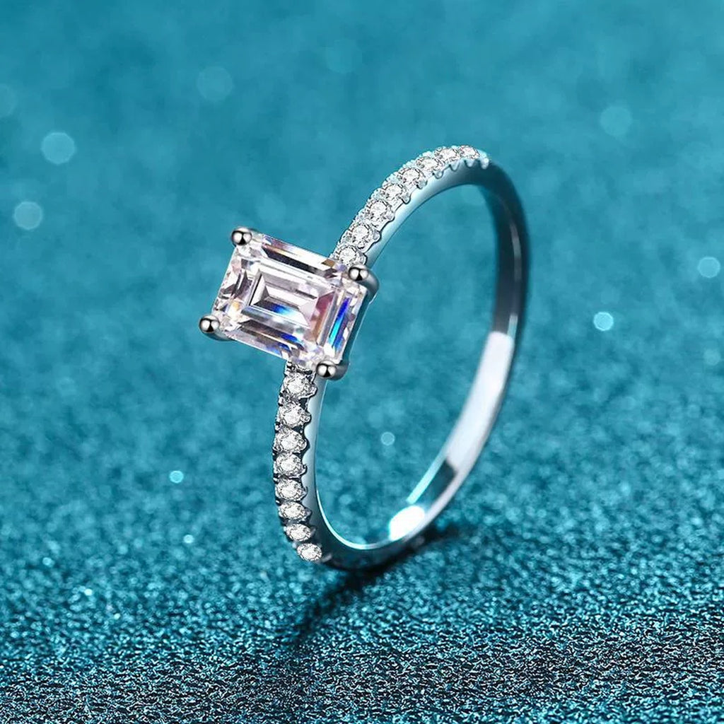 Emerald and Radiant Cut Moissanite Ring with CZ product view showing moissanite setting and rhodium finish
