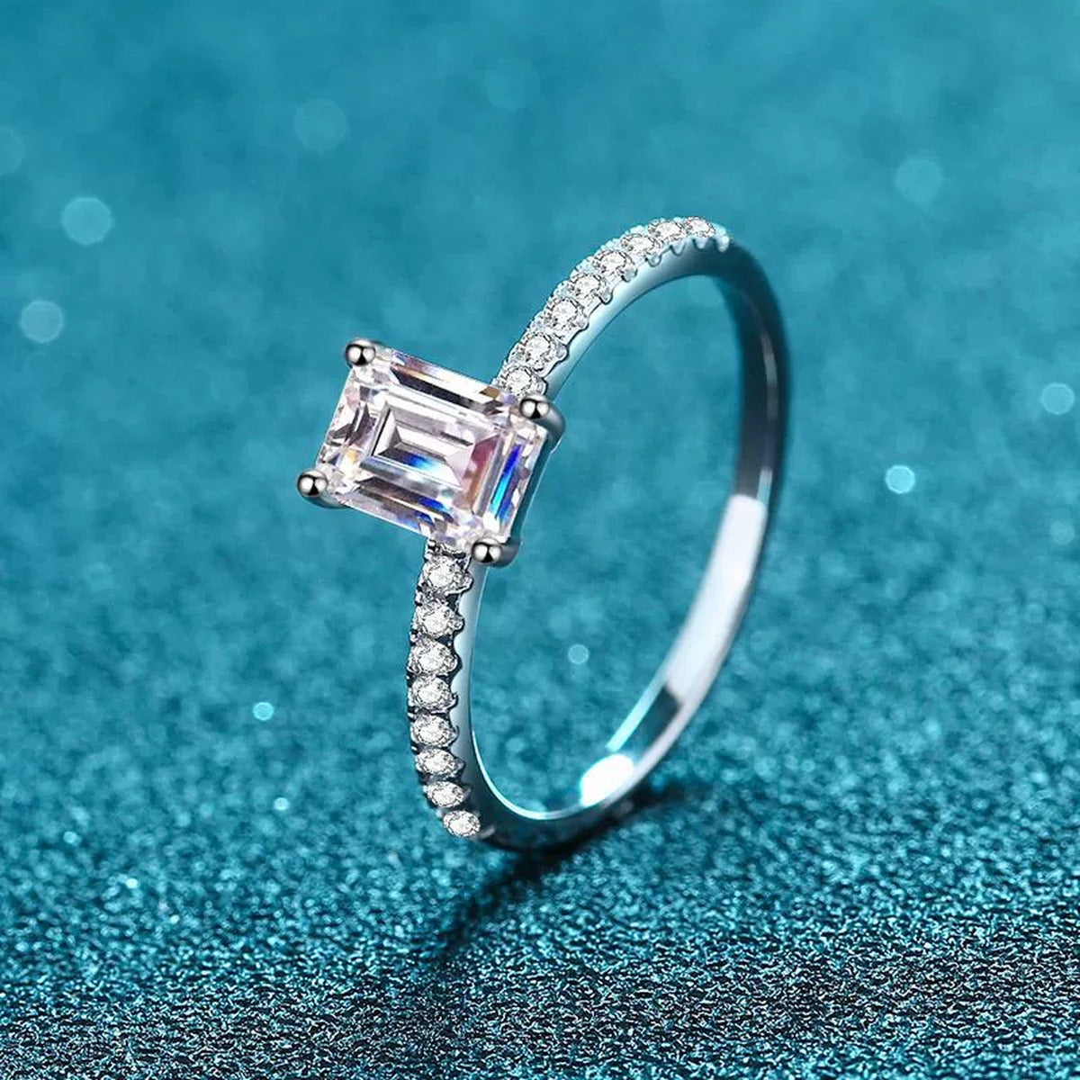 Emerald and Radiant Cut Moissanite Ring with CZ product view showing moissanite setting and rhodium finish