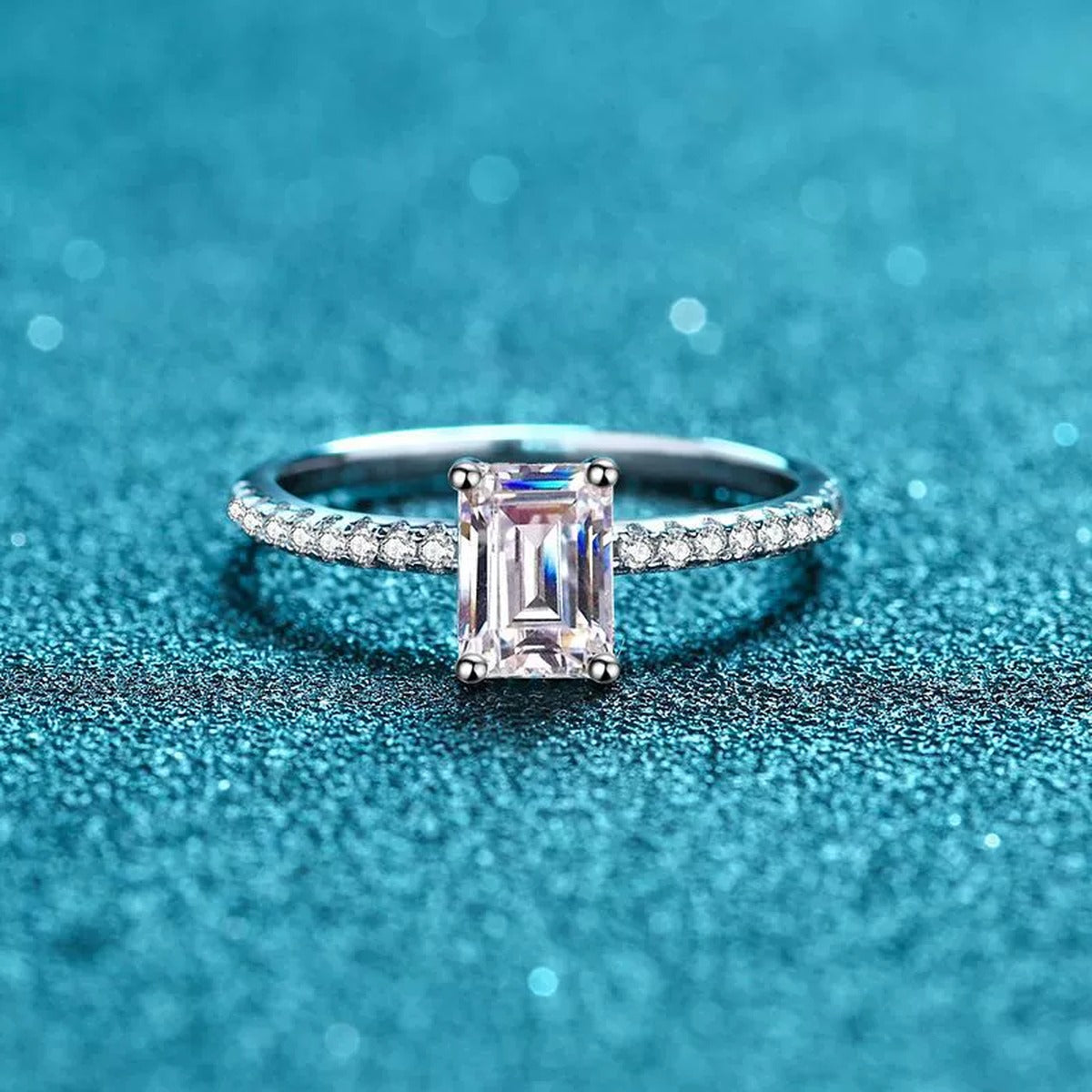Emerald and Radiant Cut Moissanite Ring with CZ product view showing moissanite setting and rhodium finish