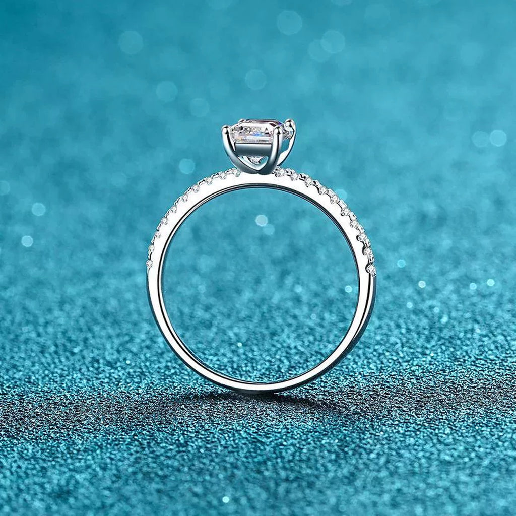 Emerald and Radiant Cut Moissanite Ring with CZ product view showing moissanite setting and rhodium finish