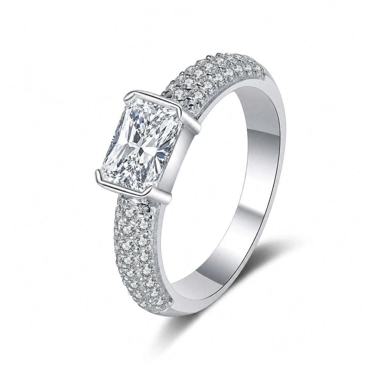 Emerald and Radiant Cut Moissanite Side Stone Engagement Ring with CZ in rhodium-plated S925 sterling silver on clean white background