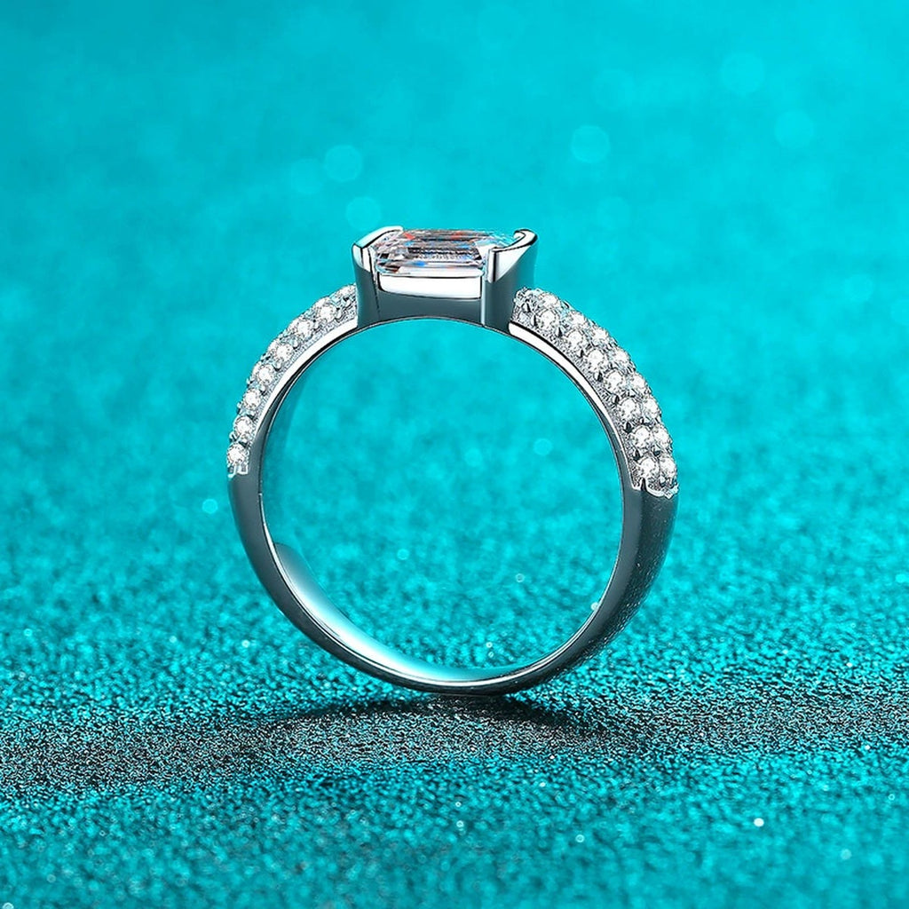 Emerald and Radiant Cut Moissanite Side Stone Engagement Ring with CZ product view showing moissanite setting and metal finish