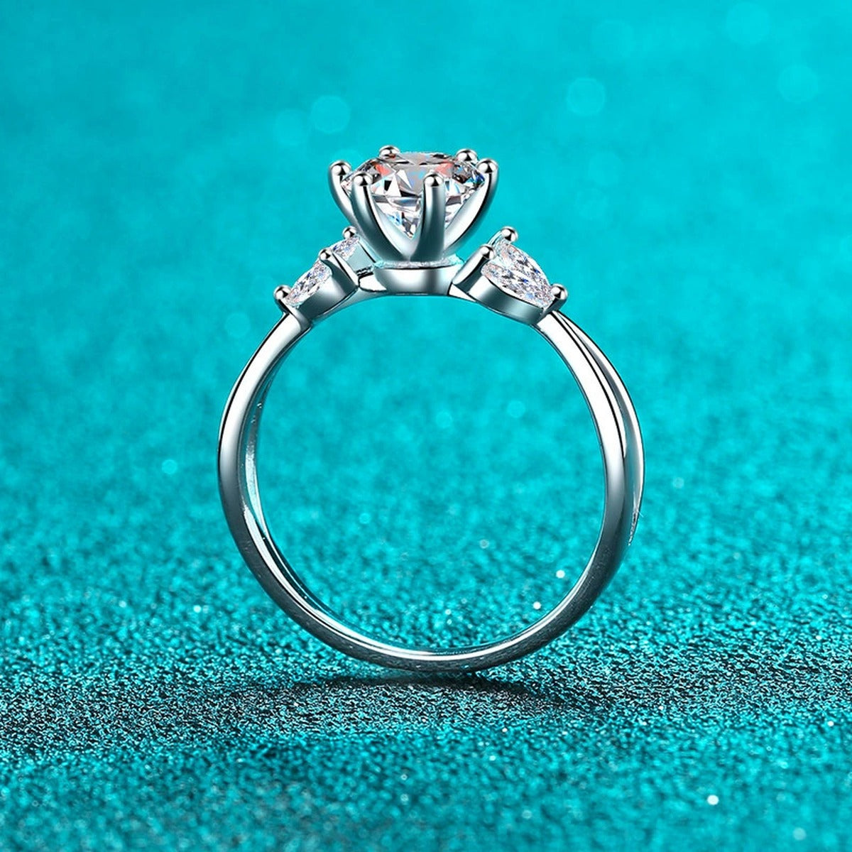 Round Moissanite Side Stone Engagement Ring with CZ product view showing moissanite setting and metal finish