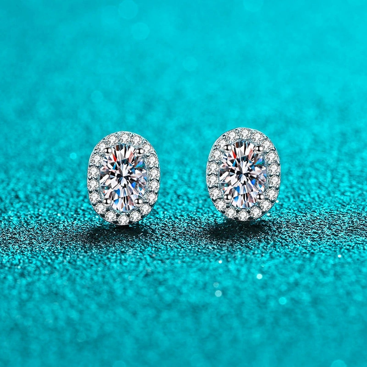 Oval Moissanite Stud Earrings with CZ in Rhodium-Plated S925 sterling silver product scene view showing front sparkle