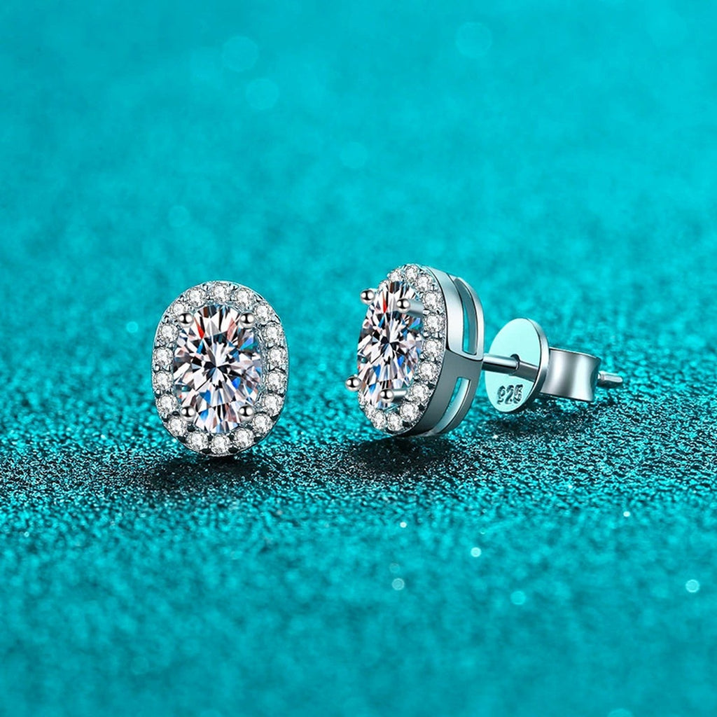 Oval Moissanite Stud Earrings with CZ in Rhodium-Plated S925 sterling silver product scene view showing angled setting detail