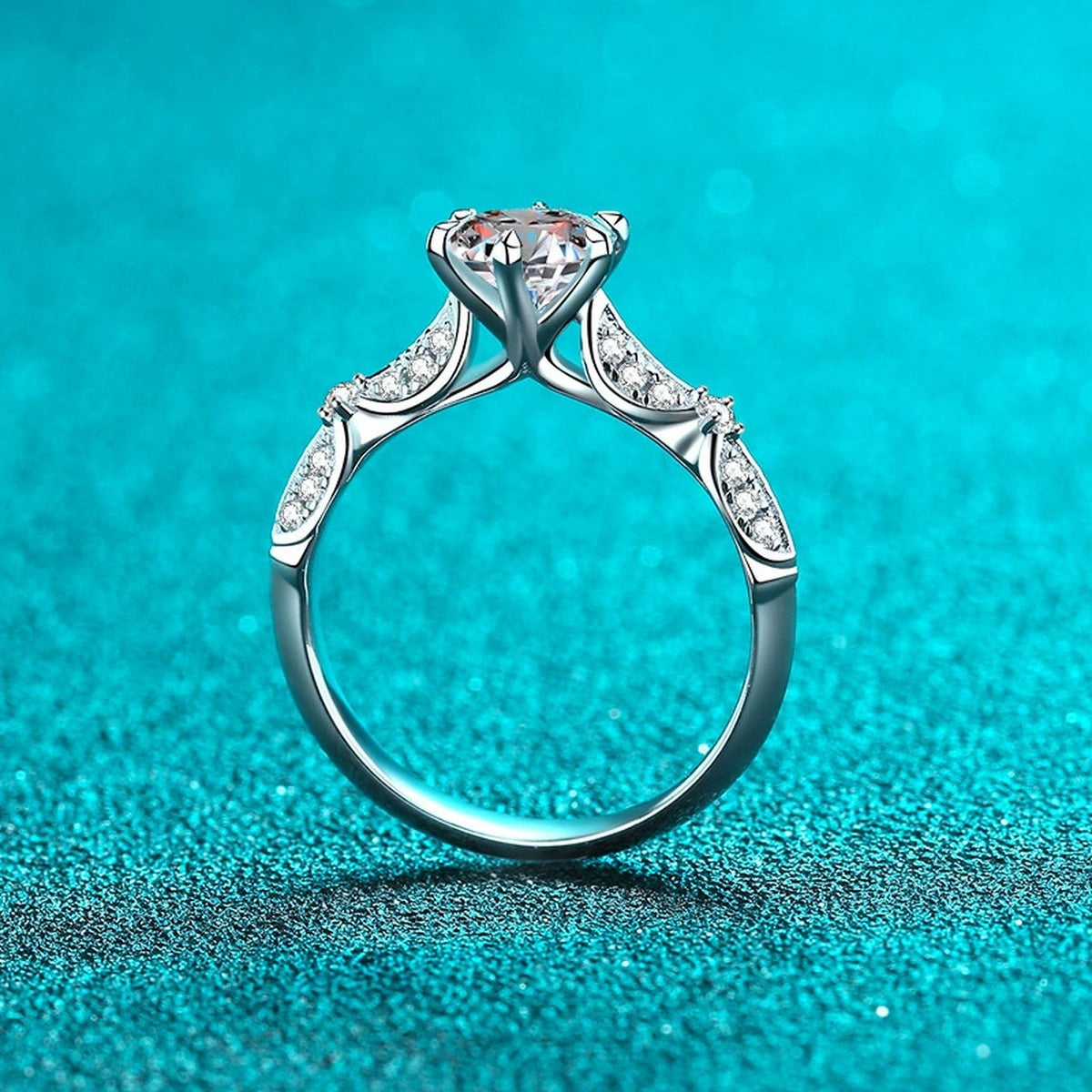 Round Moissanite Side Stone Ring with CZ product view showing moissanite setting and metal finish