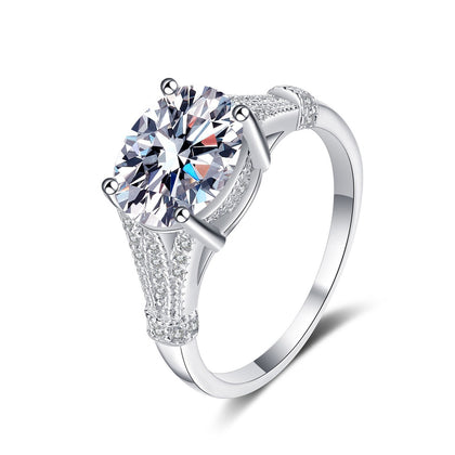 Oval Cut Moissanite Side Stone Engagement Ring with CZ in rhodium-plated S925 sterling silver on clean white background