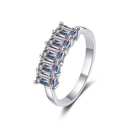 Emerald Cut Moissanite Five Stone Band Ring in Rhodium-Plated S925 Sterling Silver clean white background product photo showing the ring silhouette and moissanite setting