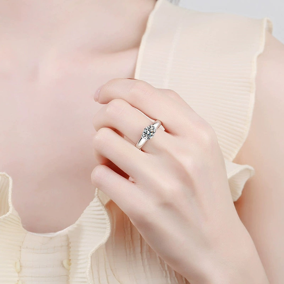Oval Cut Moissanite Ring worn on hand to show scale and ring profile