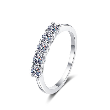 Round Moissanite Eternity Band Ring in rhodium-plated S925 sterling silver on clean white background