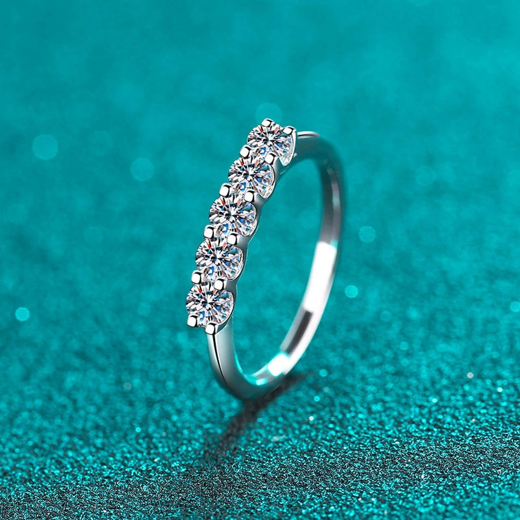 Round Moissanite Eternity Band Ring product view showing moissanite setting and rhodium finish
