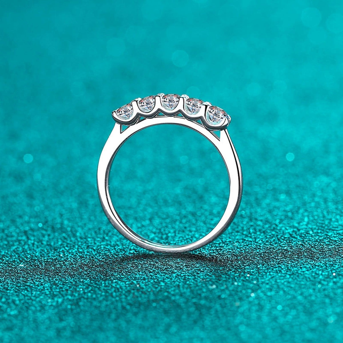 Round Moissanite Eternity Band Ring product view showing moissanite setting and rhodium finish