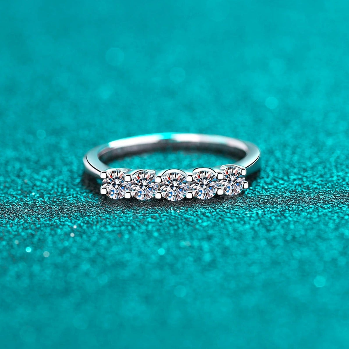 Round Moissanite Eternity Band Ring product view showing moissanite setting and rhodium finish