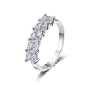 Princess Cut Moissanite Eternity Band Ring in rhodium-plated S925 sterling silver on clean white background