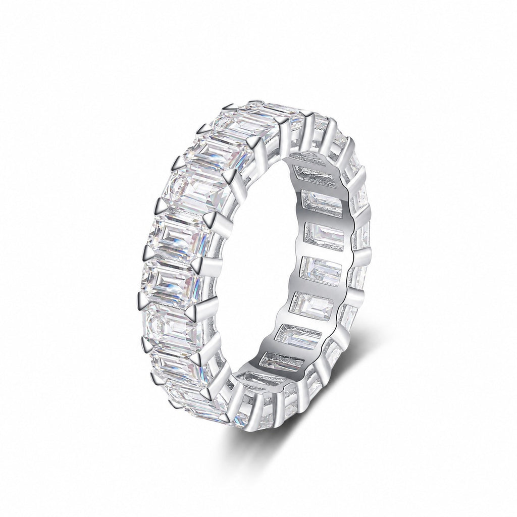 Emerald Cut Moissanite Eternity Band Ring in rhodium-plated S925 sterling silver on clean white background