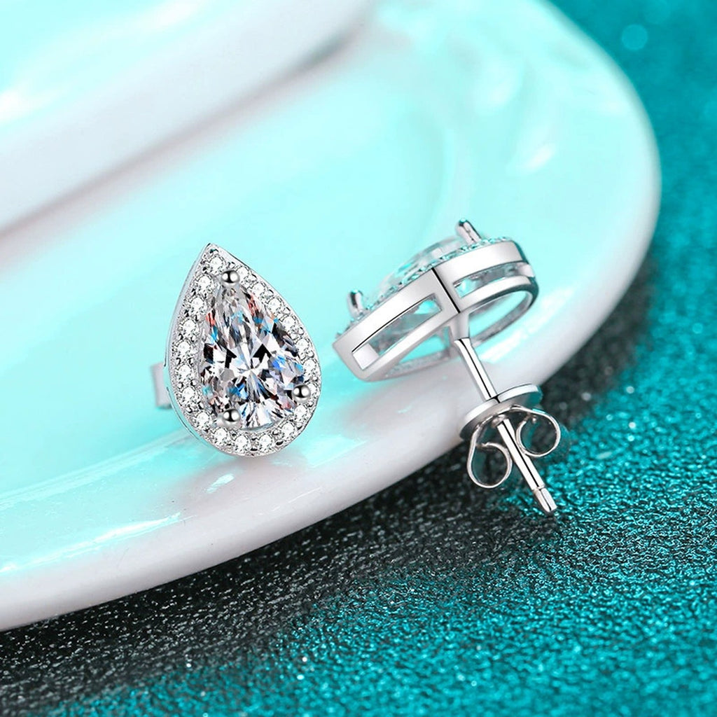 Pear Cut Moissanite Stud Earrings with CZ in Rhodium-Plated S925 sterling silver product scene view showing front sparkle