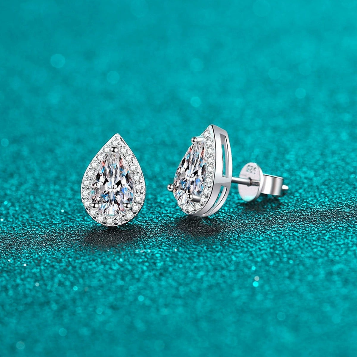 Pear Cut Moissanite Stud Earrings with CZ in Rhodium-Plated S925 sterling silver product scene view showing angled setting detail