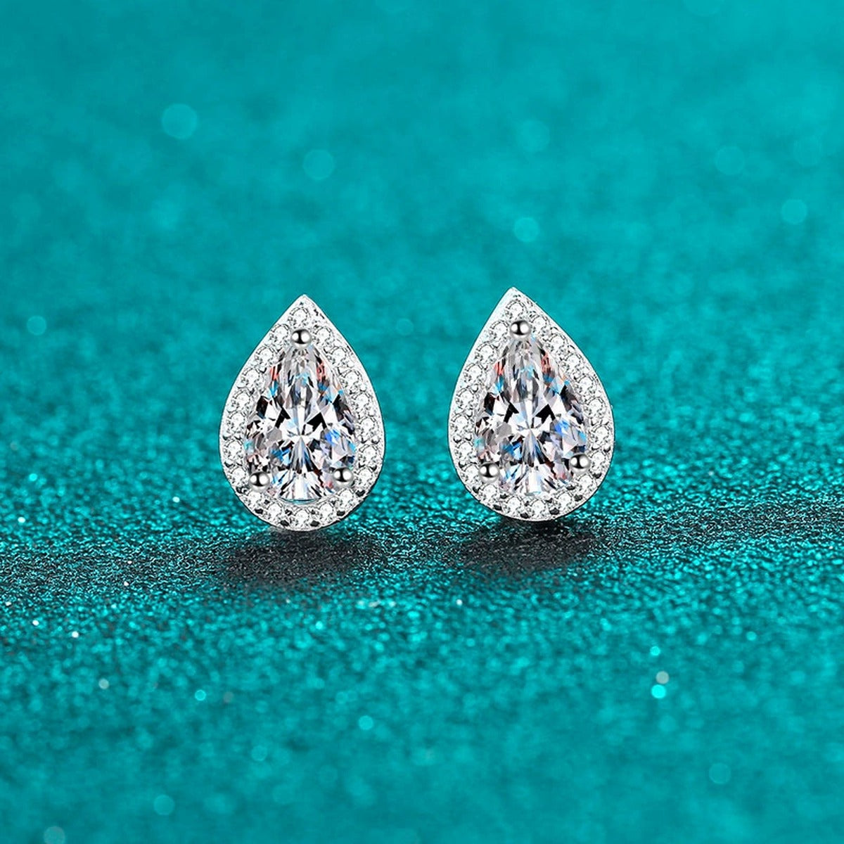 Pear Cut Moissanite Stud Earrings with CZ in Rhodium-Plated S925 sterling silver product scene view showing side profile