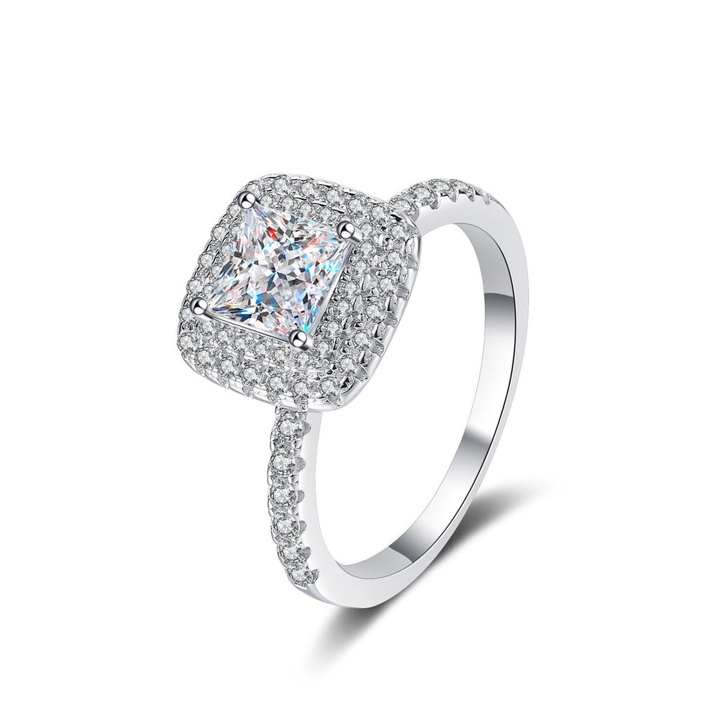 Princess Cut Moissanite Halo Engagement Ring with CZ in Rhodium-Plated S925 Sterling Silver clean white background product photo showing the ring silhouette and moissanite setting