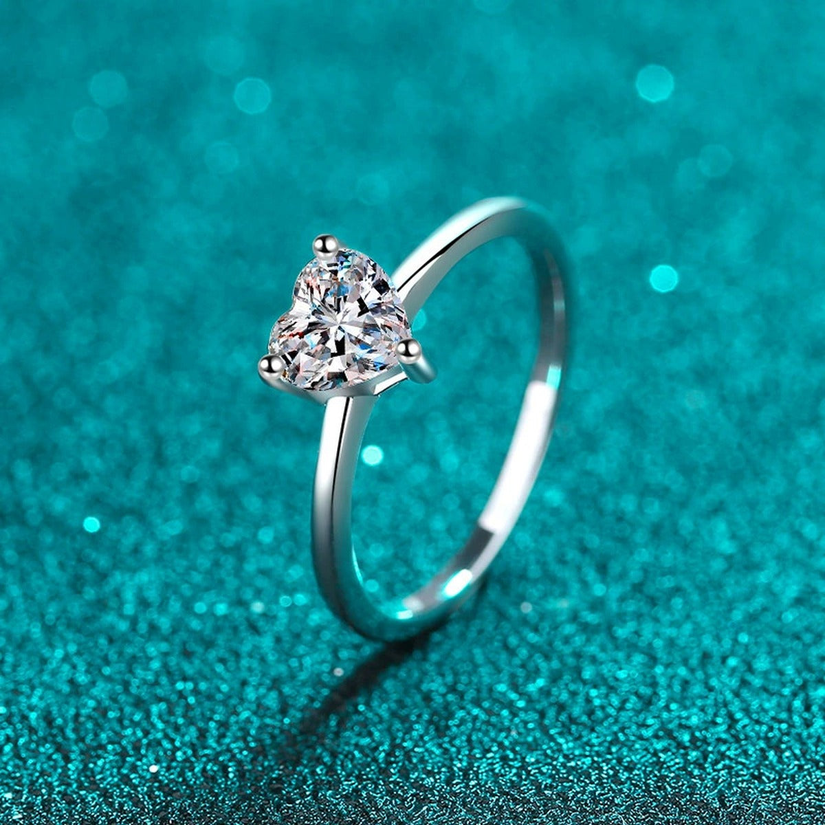Heart Cut Moissanite Promise Ring in Rhodium-Plated S925 Sterling Silver blue display product photo showing the moissanite setting, stone cut, and band profile