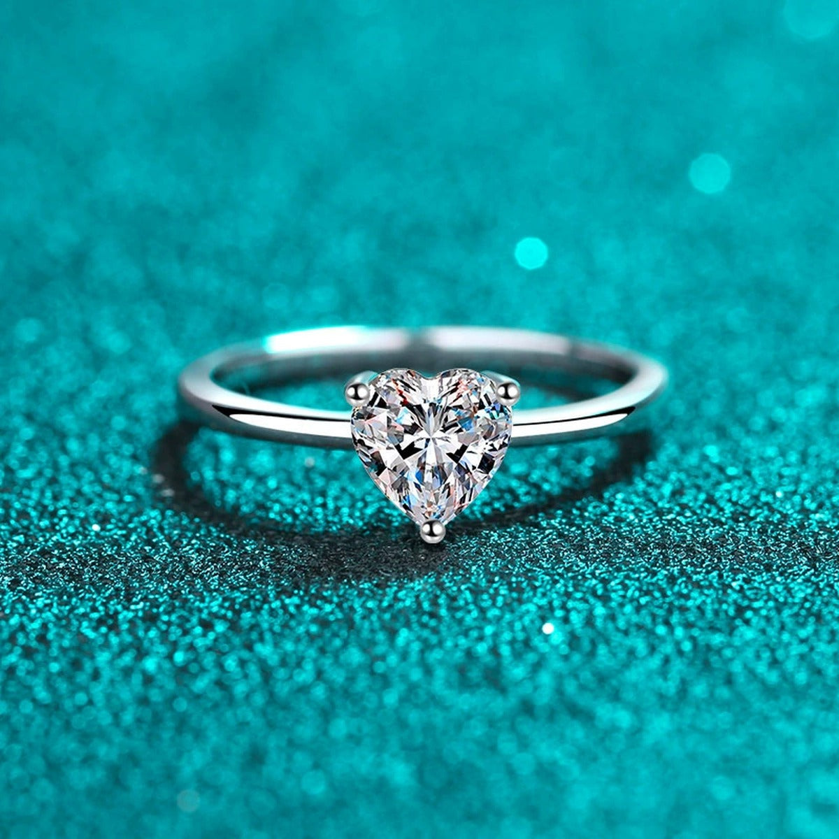 Heart Cut Moissanite Promise Ring in Rhodium-Plated S925 Sterling Silver blue display product photo showing the moissanite setting, stone cut, and band profile