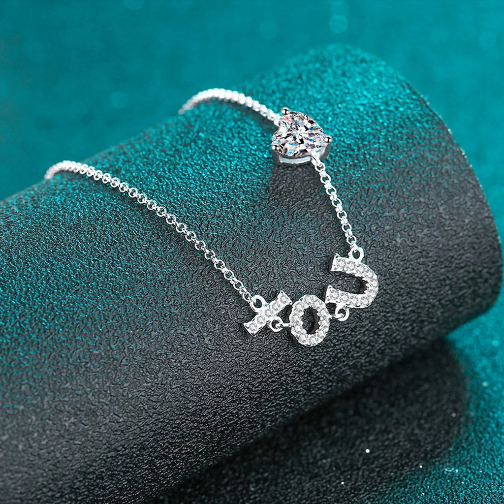LOVE Heart Moissanite Adjustable Bracelet with CZ in Rhodium-Plated S925 sterling silver angled product display showing bracelet silhouette