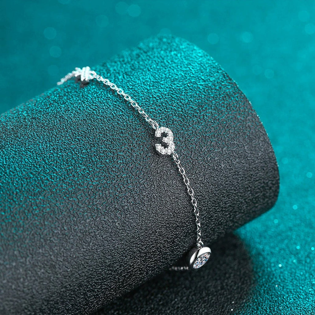 Number Charm Moissanite Adjustable Bracelet with CZ in Rhodium-Plated S925 sterling silver angled product display showing bracelet silhouette