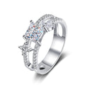 Princess Cut Moissanite Side Stone Engagement Ring with CZ in Rhodium-Plated S925 Sterling Silver clean white background product photo showing the ring silhouette and moissanite setting