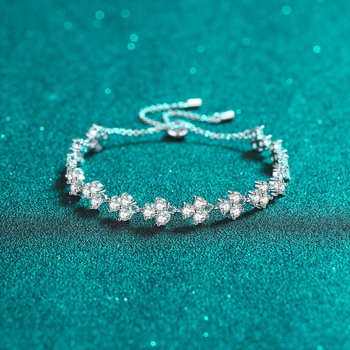 Floral Tennis Moissanite Adjustable Bracelet in Rhodium-Plated S925 sterling silver styled product scene showing stone sparkle and chain detail