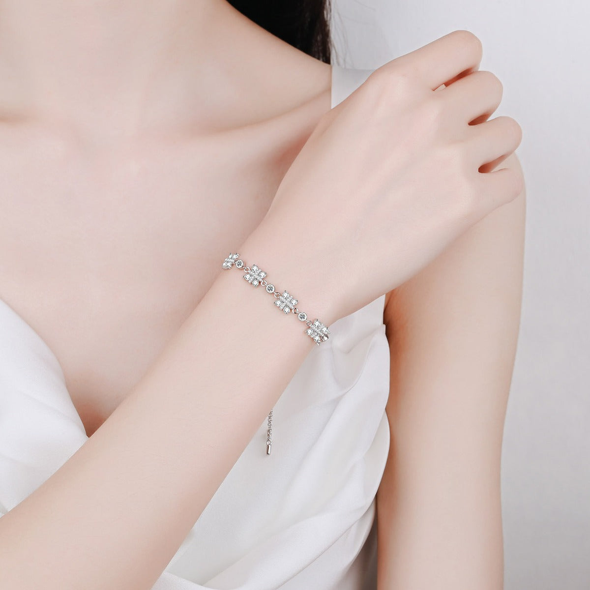 Clover Moissanite Adjustable Bracelet in Rhodium-Plated S925 sterling silver worn on wrist model view showing scale and adjustable fit
