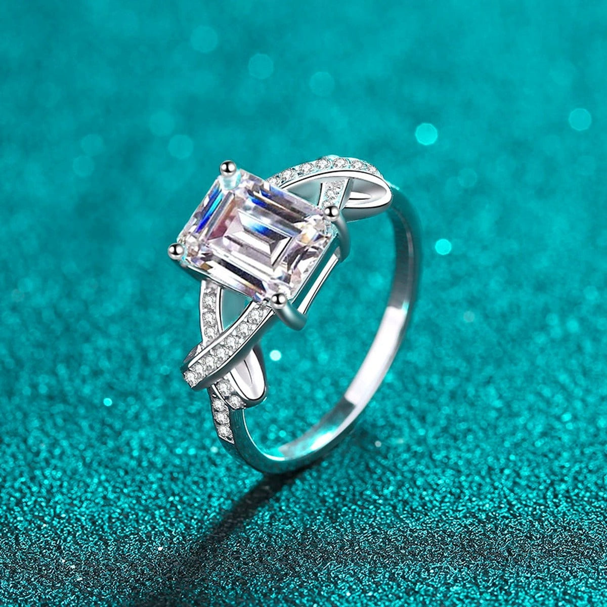 Emerald and Radiant Cut Moissanite Engagement Ring with CZ in Rhodium-Plated S925 Sterling Silver blue display product photo showing the moissanite setting, stone cut, and band profile