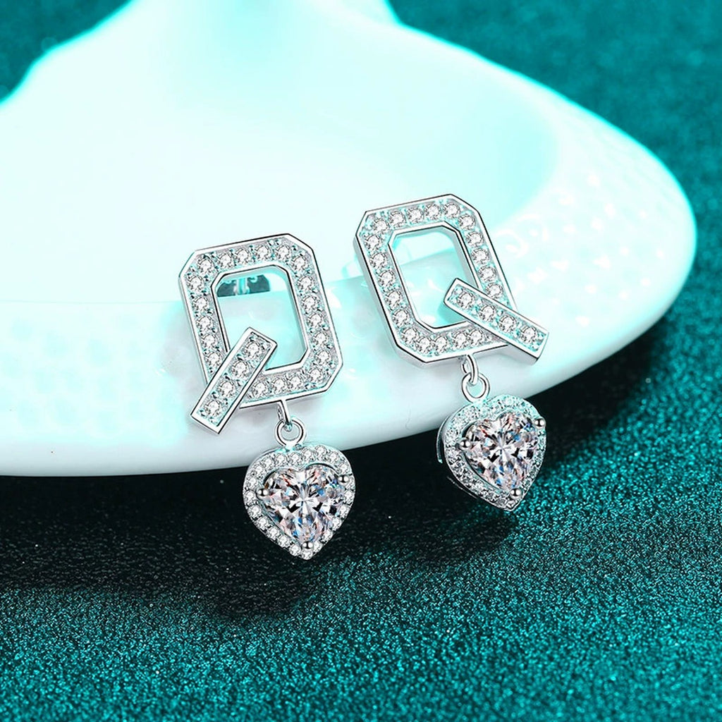 Heart Moissanite Stud Dangle Earrings with CZ in Rhodium-Plated S925 sterling silver product scene view showing angled setting detail